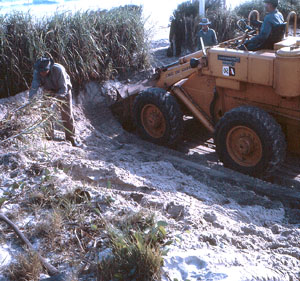 Removing sand from Kings Beach